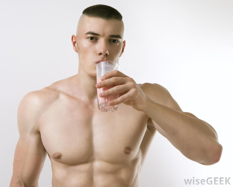 shirtless-man-drinking-protein-shake